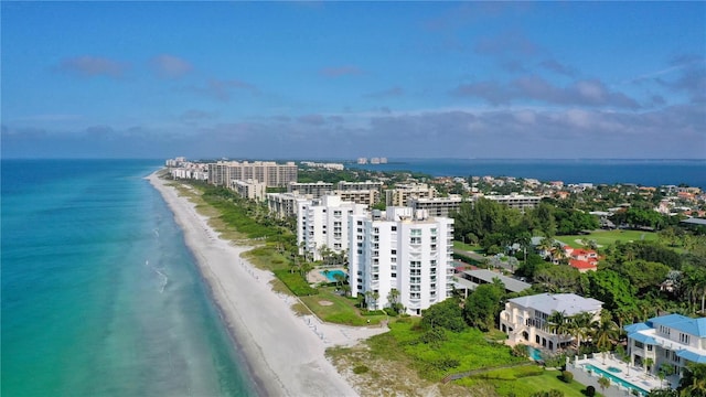 aerial view with a beach view and a water view