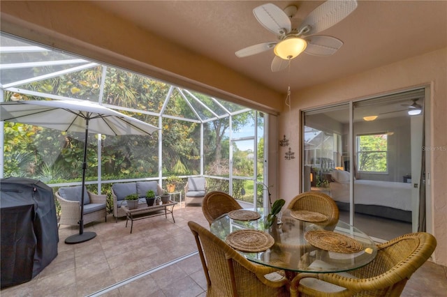 sunroom / solarium with ceiling fan