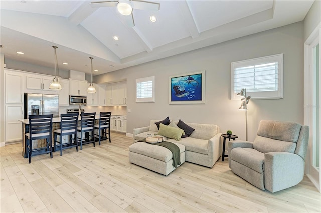 living room featuring beam ceiling, high vaulted ceiling, ceiling fan, and light wood-type flooring