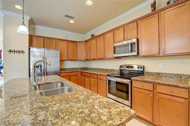 kitchen featuring appliances with stainless steel finishes, sink, hanging light fixtures, ornamental molding, and light stone counters