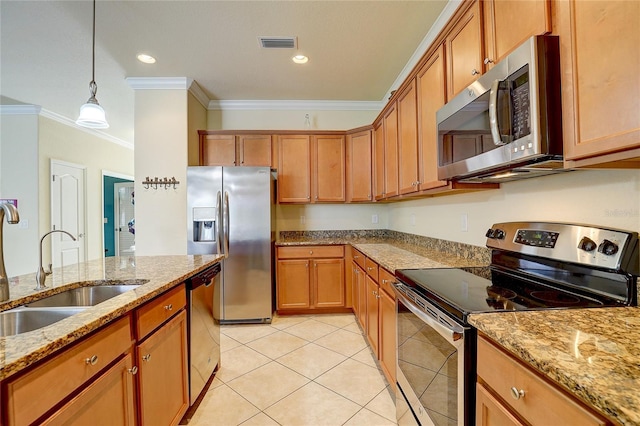 kitchen with sink, crown molding, appliances with stainless steel finishes, pendant lighting, and light stone countertops