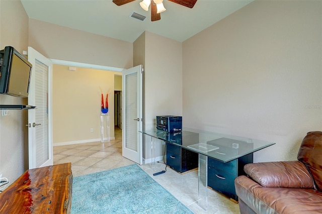 office featuring light tile patterned flooring and ceiling fan