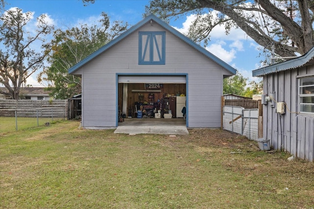 garage featuring a yard