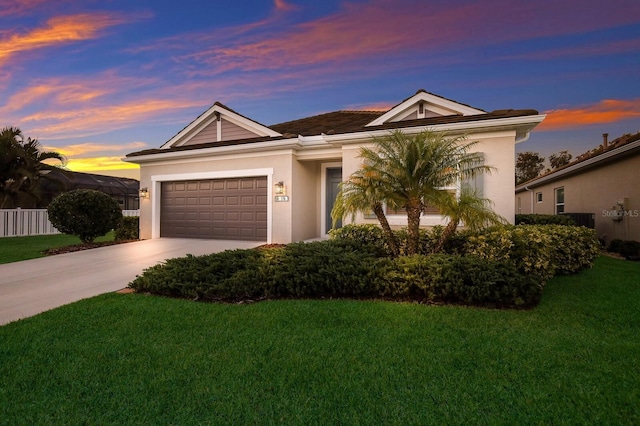 176 Avens Dr, Nokomis, FL 34275 - ranch-style home with fence, stucco siding, concrete driveway, a front yard, and a garage