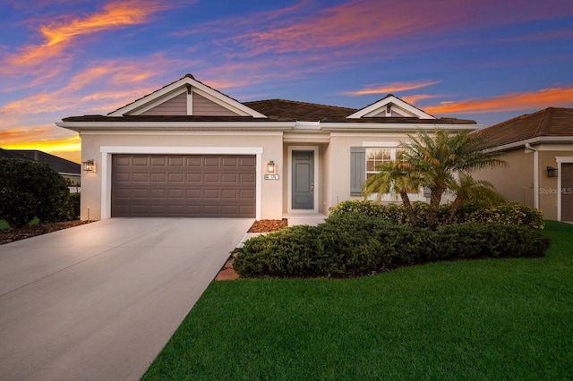 176 Avens Dr, Nokomis, FL 34275 - ranch-style home featuring an attached garage, driveway, stucco siding, and a lawn