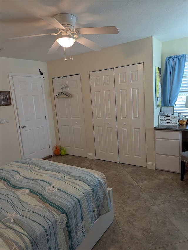 bedroom with light tile patterned floors and ceiling fan