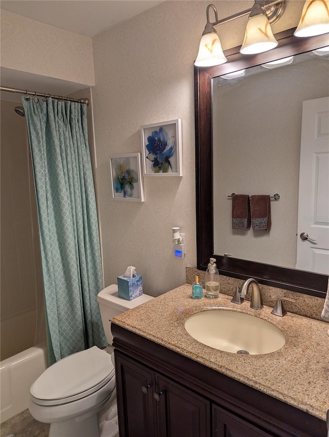 full bathroom with shower / bathtub combination with curtain, vanity, and toilet