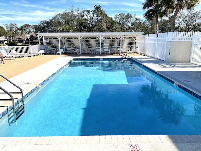 view of swimming pool featuring a patio area