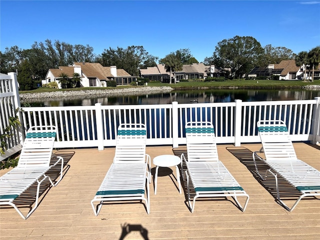 wooden terrace with a water view