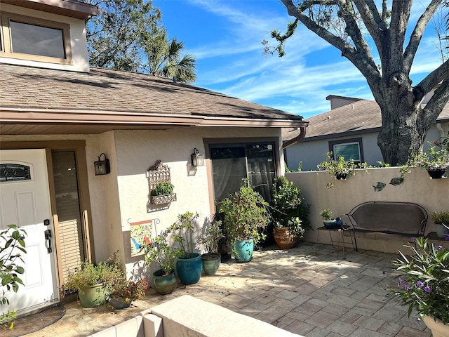 view of patio / terrace featuring fence