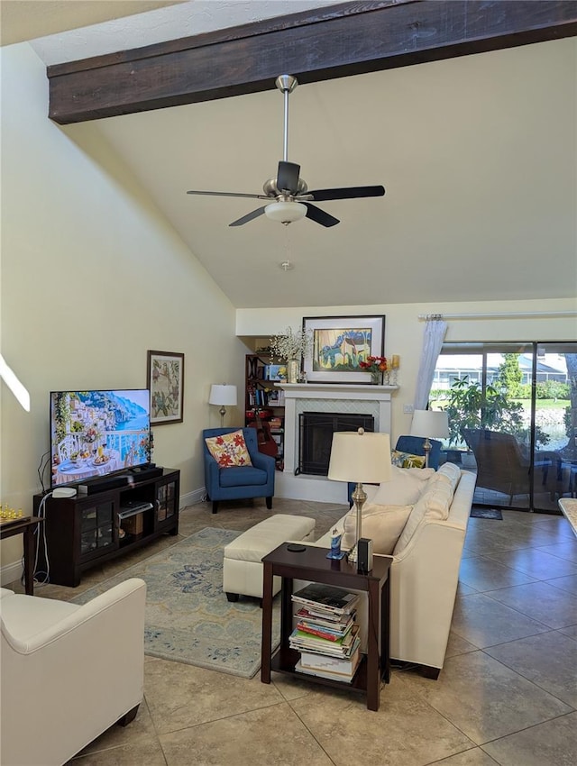 living room featuring high vaulted ceiling, a high end fireplace, ceiling fan, tile patterned flooring, and beamed ceiling