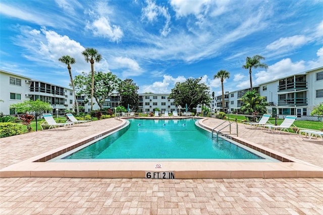 view of pool featuring a patio