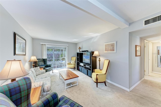 living room featuring light colored carpet