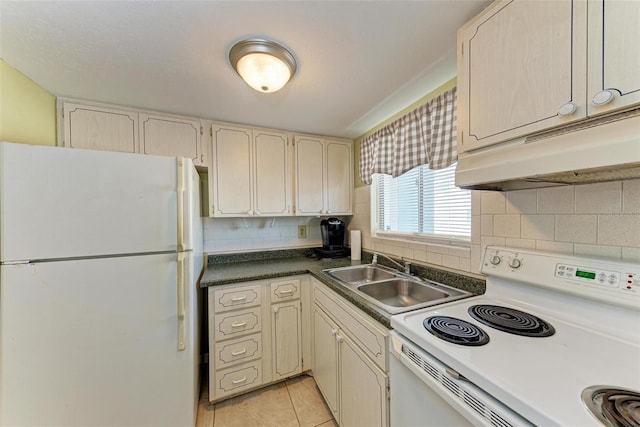 kitchen featuring sink, backsplash, white appliances, and light tile patterned floors