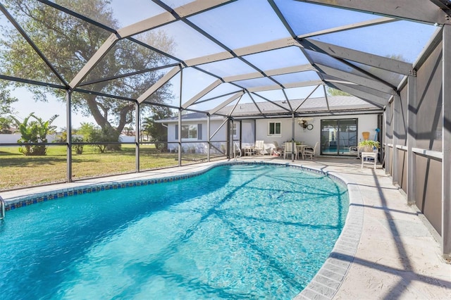 view of pool featuring a lanai, a lawn, and a patio