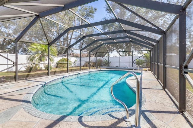 view of pool featuring a lanai and a patio area