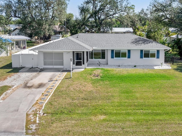 single story home with a front lawn