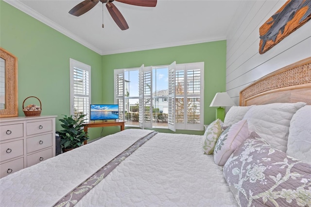 bedroom featuring ceiling fan and ornamental molding