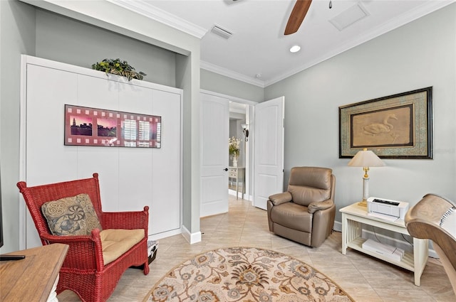 living area featuring light tile patterned floors, crown molding, and ceiling fan