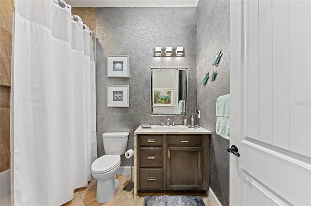 bathroom with vanity, a shower with curtain, tile patterned floors, and toilet