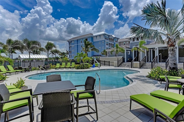 view of swimming pool featuring a patio area