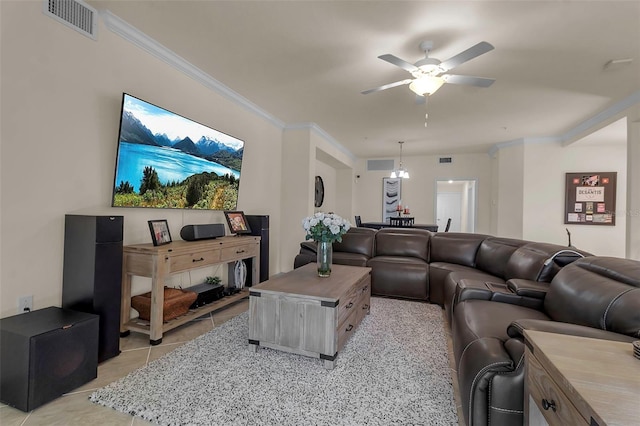 living room featuring ceiling fan, ornamental molding, and light tile patterned floors