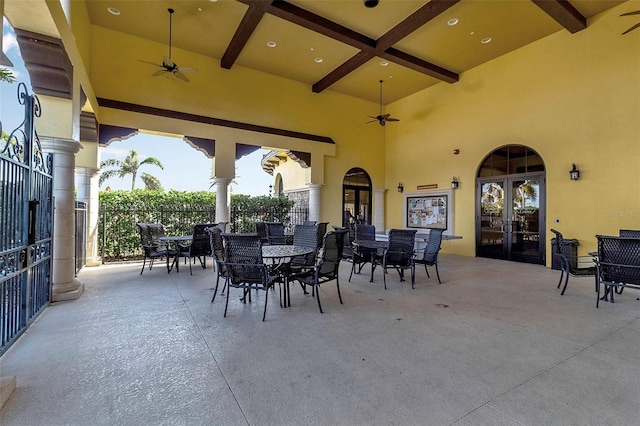 view of patio / terrace featuring ceiling fan and french doors