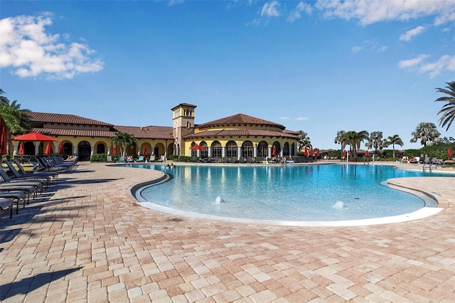 view of pool featuring pool water feature