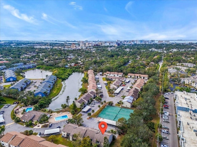 birds eye view of property featuring a water view