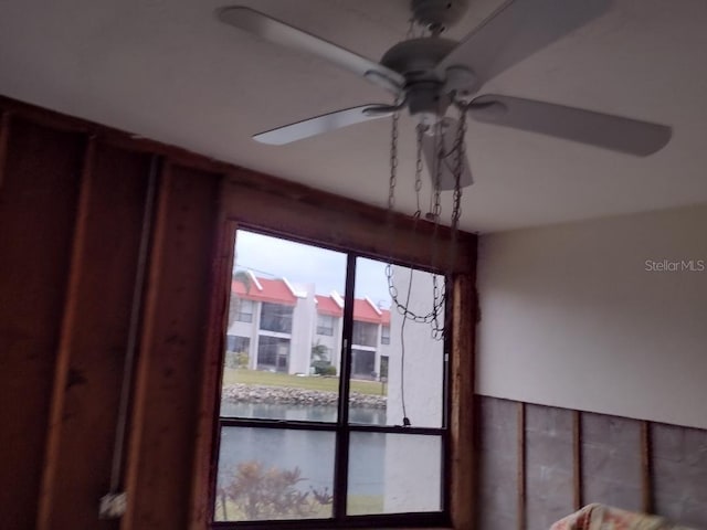 interior details featuring ceiling fan