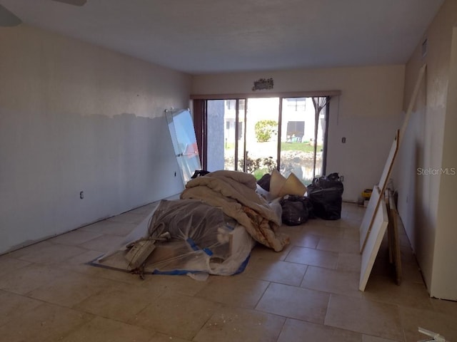 1801 Gulf Dr N Unit 121, Bradenton Beach, FL 34217 - living area featuring tile patterned floors