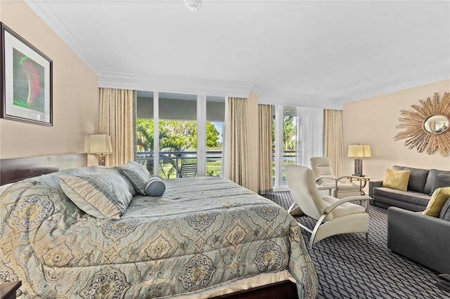 bedroom with a wall of windows and ornamental molding