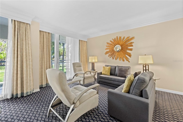 carpeted living room with crown molding and plenty of natural light