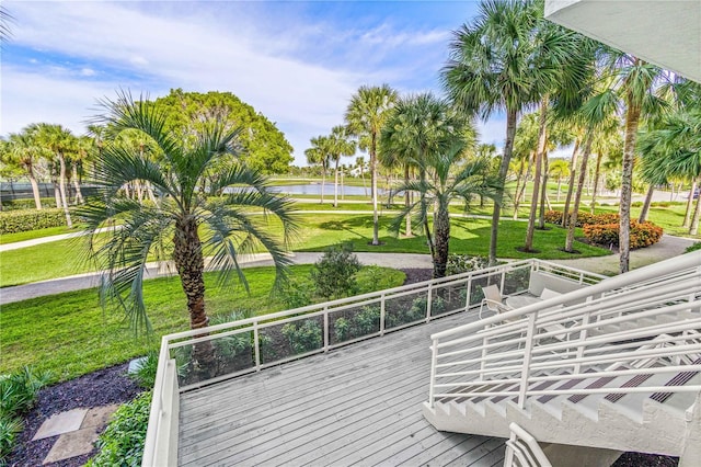 view of home's community featuring a lawn