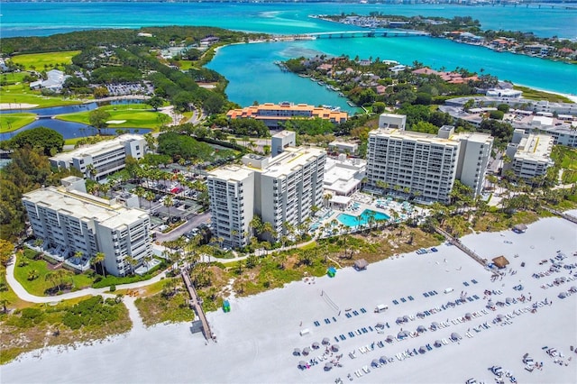 bird's eye view with a water view and a view of the beach