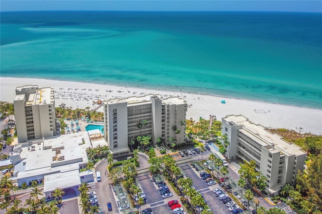 aerial view featuring a beach view and a water view