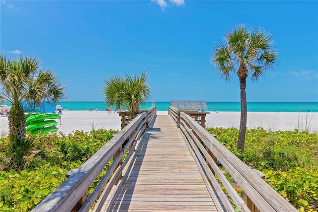 property view of water featuring a beach view