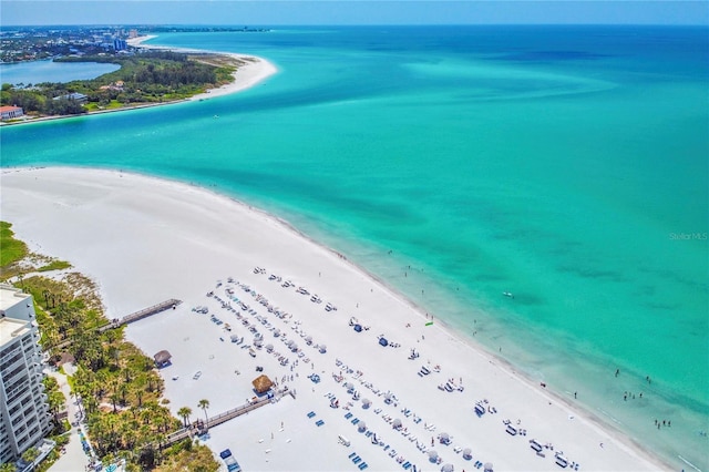 aerial view with a view of the beach and a water view