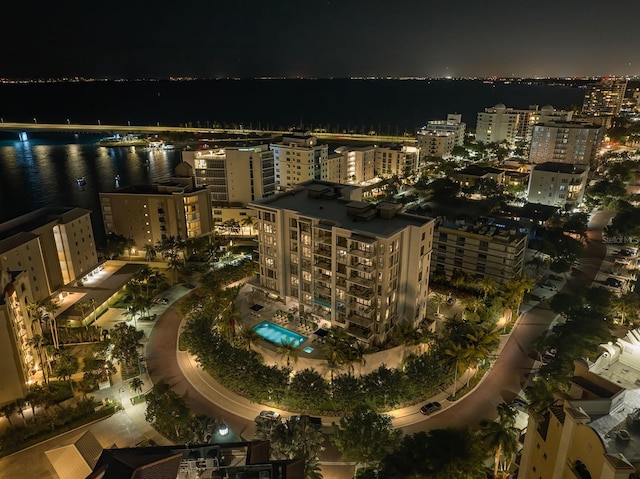 aerial view at night with a water view