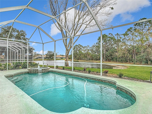 view of pool featuring glass enclosure and a lawn