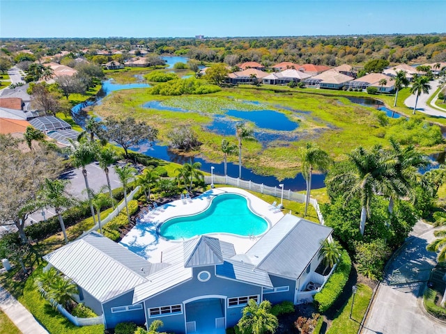 birds eye view of property featuring a water view