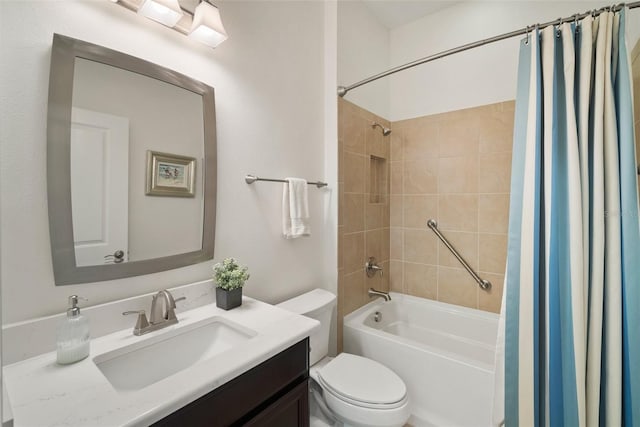 full bathroom with shower / bathtub combination with curtain, vanity, and toilet