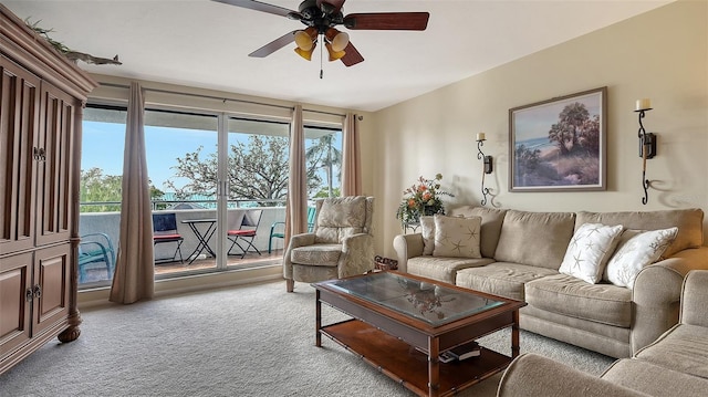 living room featuring ceiling fan and light colored carpet