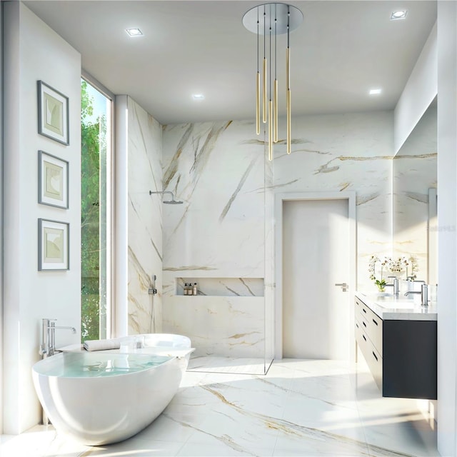 bathroom featuring a wall of windows, vanity, and a bathing tub