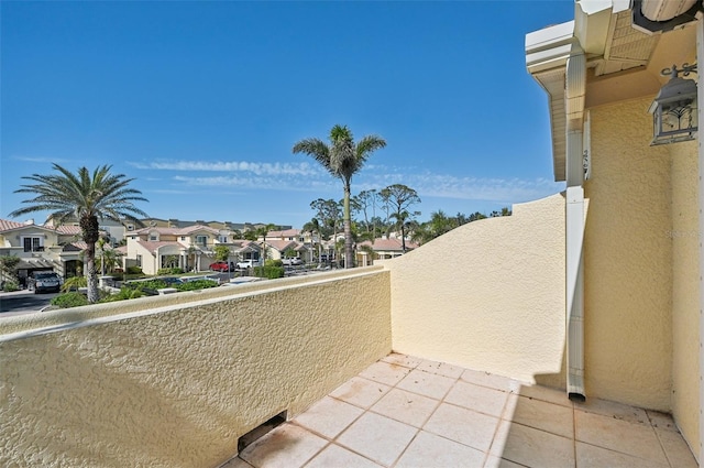 view of patio featuring a balcony