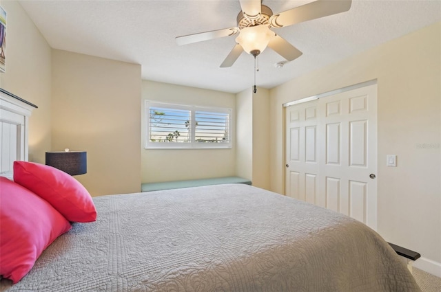 bedroom with a closet and ceiling fan