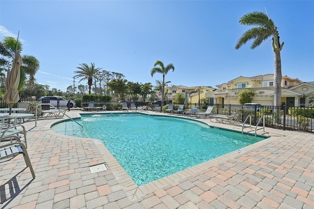 view of swimming pool featuring a patio