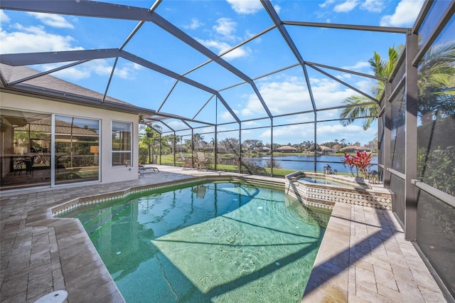 view of swimming pool featuring a patio, a lanai, a water view, and an in ground hot tub