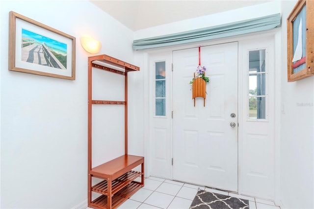 entryway featuring light tile patterned floors