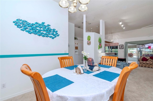 view of carpeted dining space